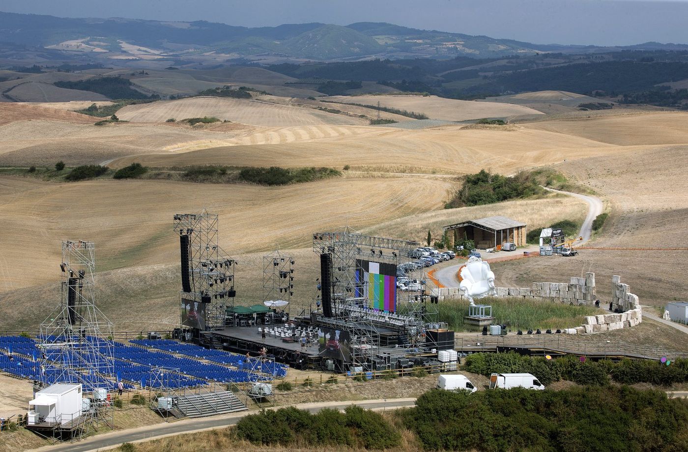 The Teatro del Silenzio being built in the hills at Lajatico, stage and seating set against open fields